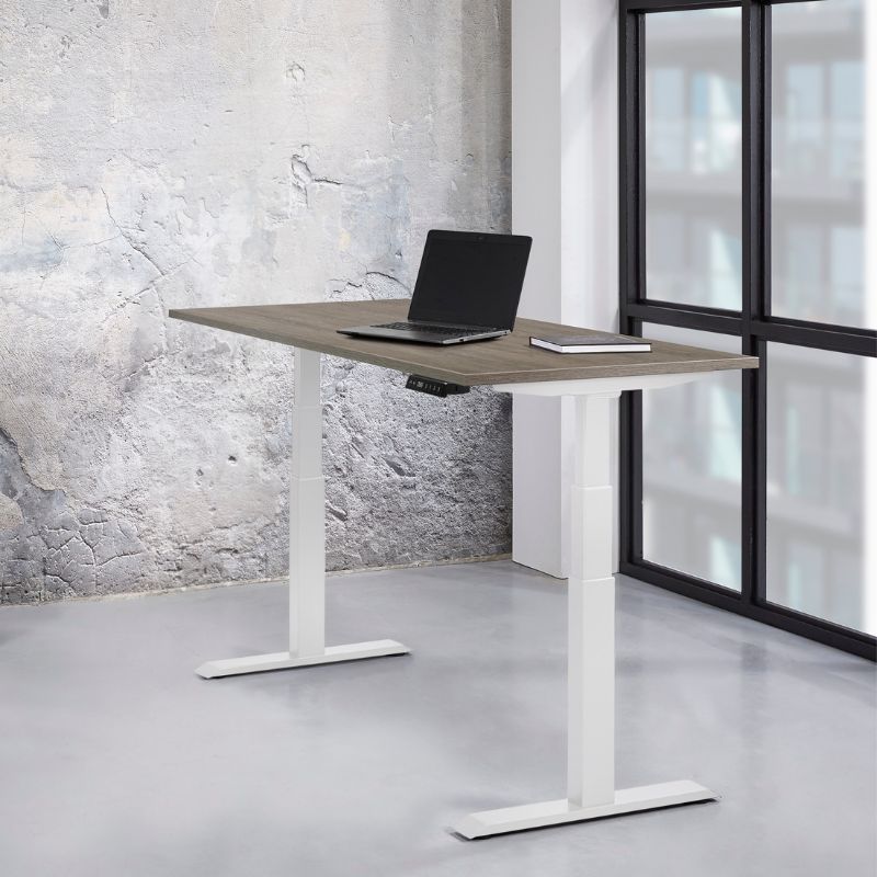 zit-sta bureau met laptop en boekje