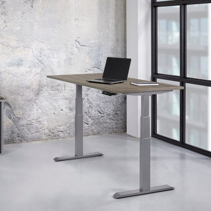 zit-sta bureau met laptop en boekje